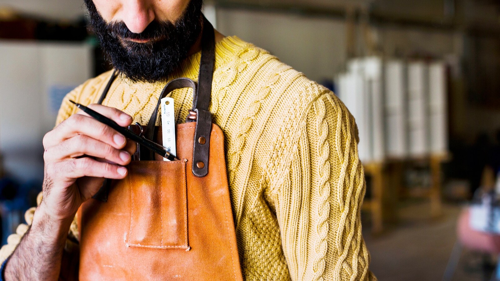 Man with brown apron