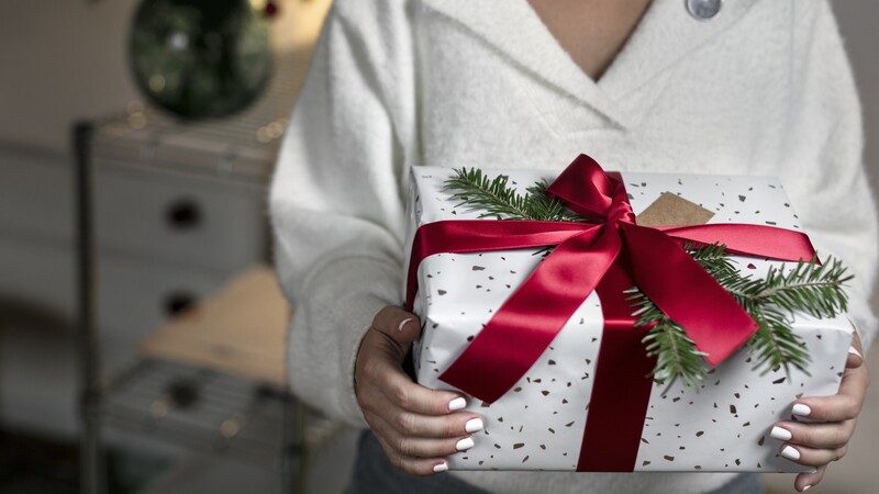 Woman with Christmas present