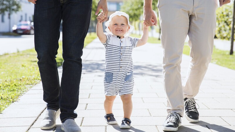 Two fathers with children.