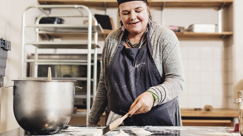  A woman baking.