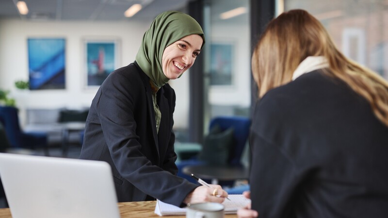 Two women in conversation